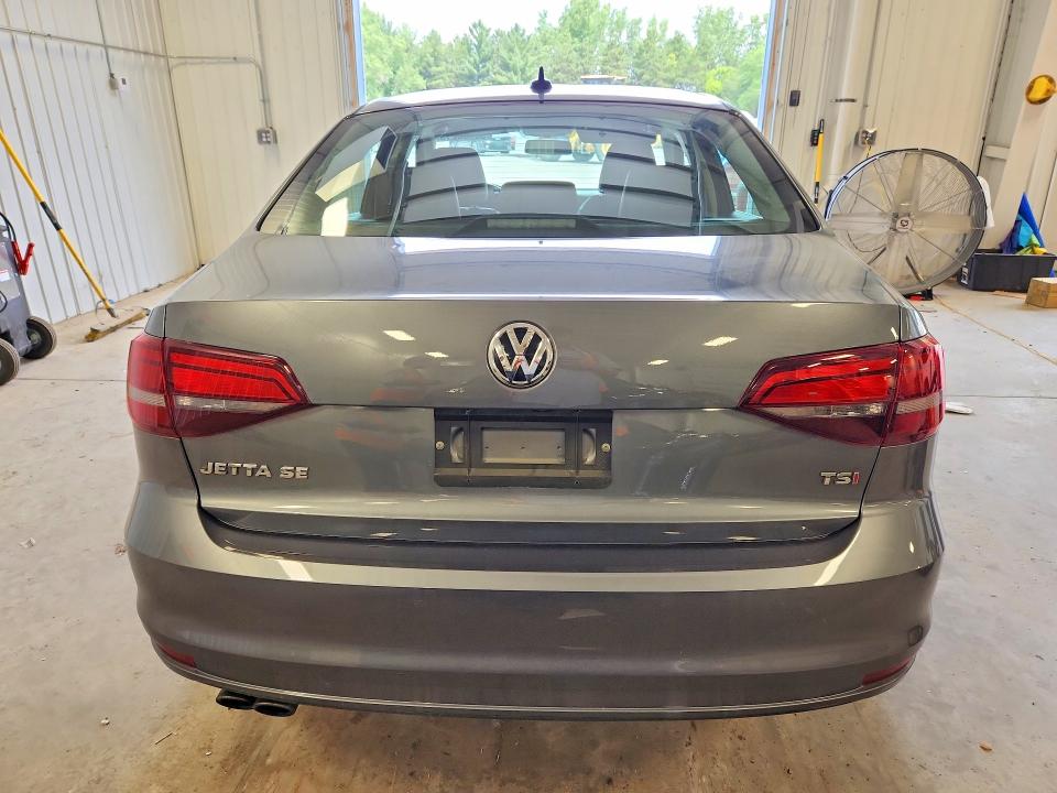 Photo 6 from auction – 2018 VOLKSWAGEN JETTA with VIN 3VWDB7AJ9JM247461