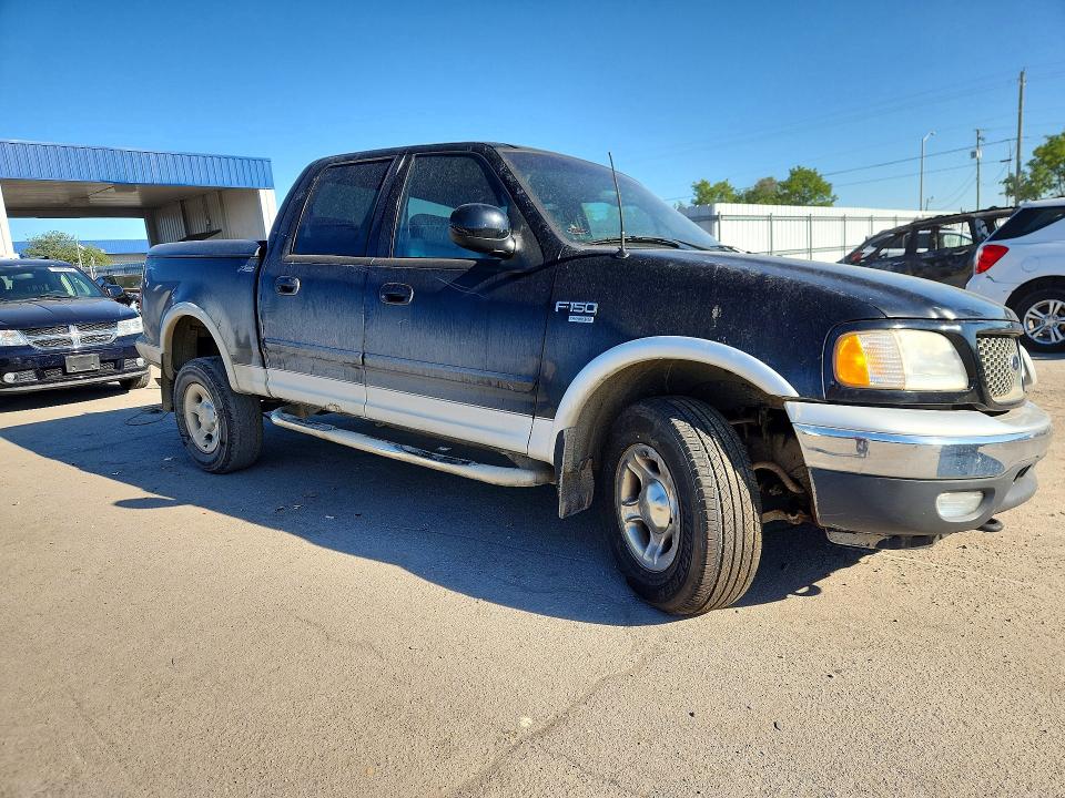 Photo 4 from auction – 2001 FORD F150 with VIN 1FTRW08WX1KF89773