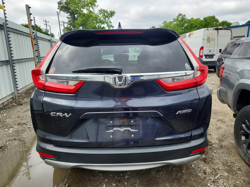 Photo 6 from auction – 2017 HONDA CR-V with VIN 2HKRW2H81HH684325