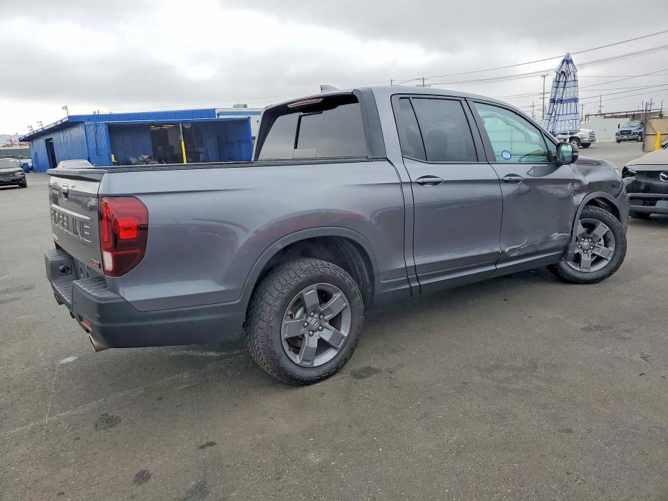 Photo 3 from auction – 2025 HONDA RIDGELINE with VIN 5FPYK3F63SB017476