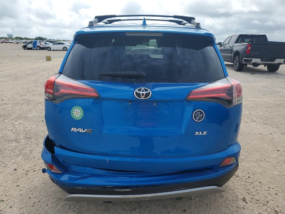 Снимка 6 от търг – 2018 TOYOTA RAV4 с VIN 2T3WFREV5JW429049