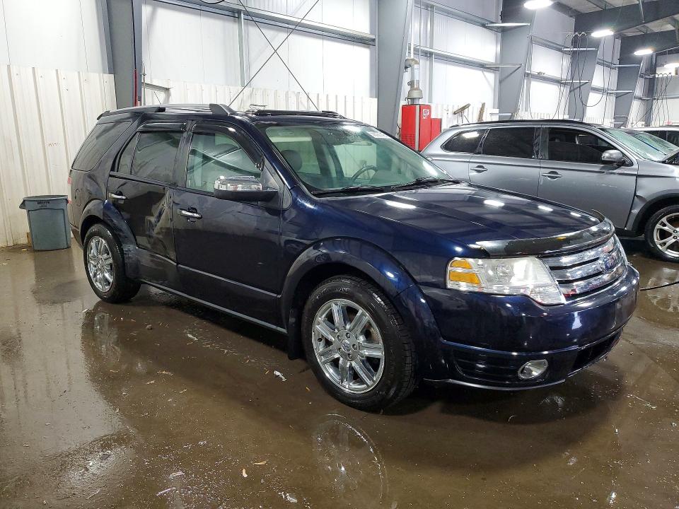 Photo 4 from auction – 2008 FORD TAURUS X with VIN 1FMDK06W28GA30221