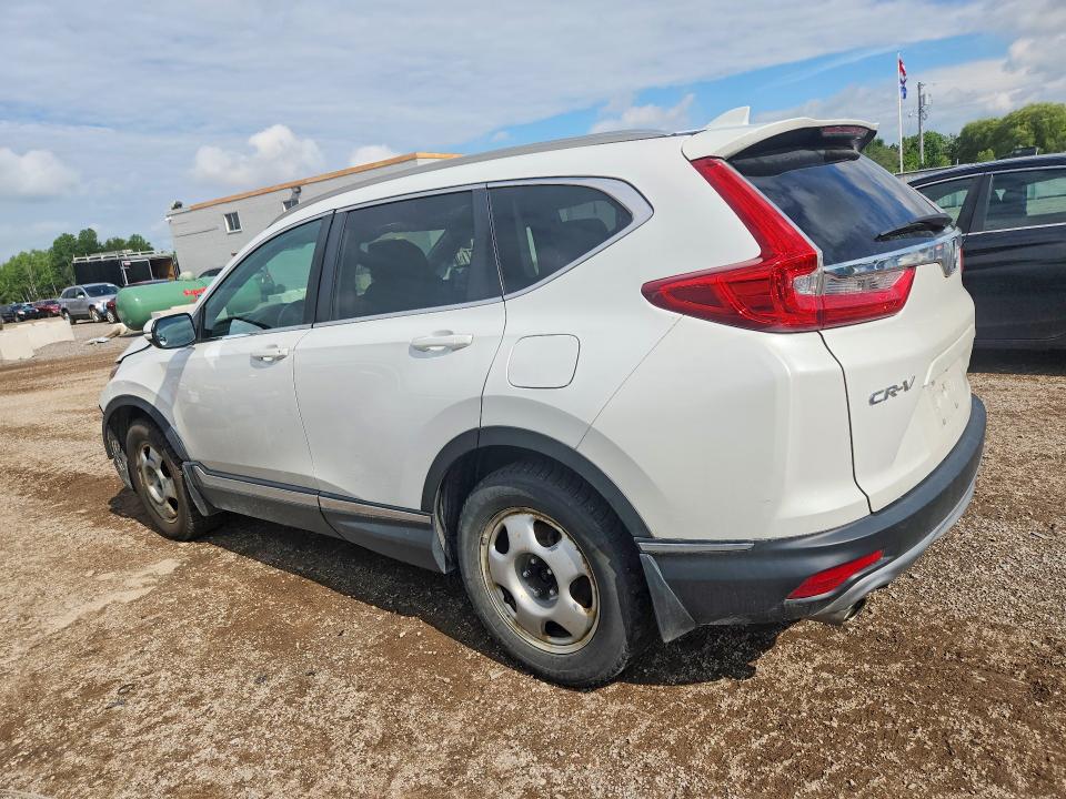 Photo 2 from auction – 2019 HONDA CR-V with VIN 2HKRW2H9XKH135240