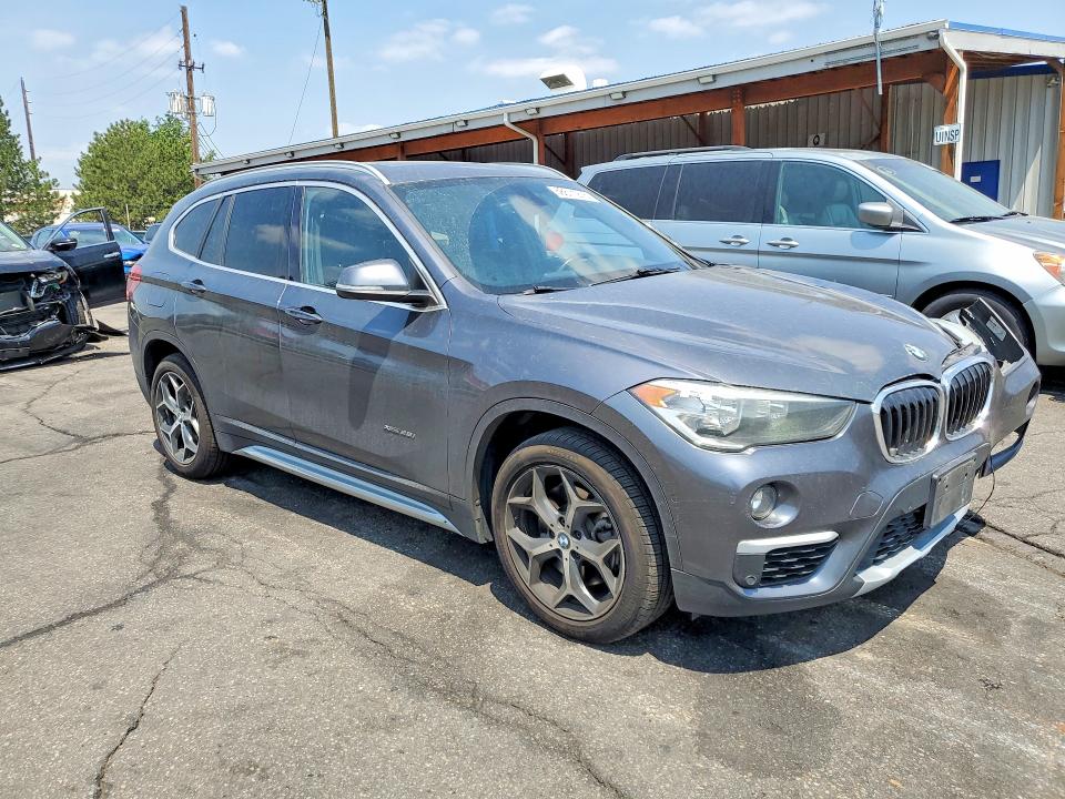 Photo 4 from auction – 2018 BMW X1 with VIN WBXHT3Z39J4A66393