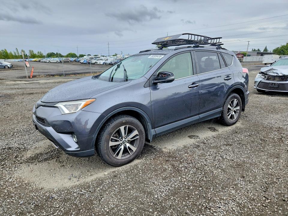 TOYOTA RAV4 2018 with VIN JTMRFREV1JD226461 - Photo from auction