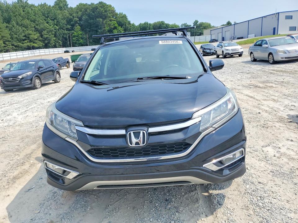 Photo 5 from auction – 2016 HONDA CR-V with VIN 2HKRM4H59GH718016