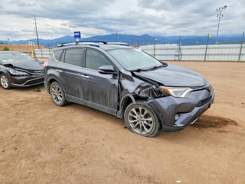 Photo 4 from auction – 2016 TOYOTA RAV4 with VIN JTMDFREV0GJ058722