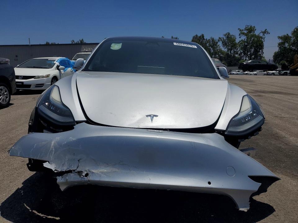 Photo 5 from auction – 2018 TESLA MODEL 3 with VIN 5YJ3E1EA2JF044087