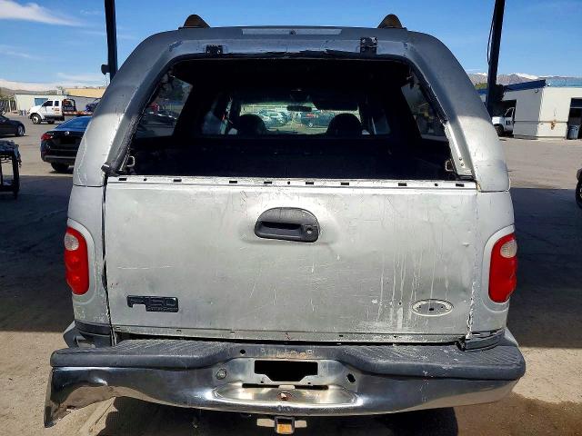 Photo 6 from auction – 2001 FORD F150 with VIN 1FTRW07W11KE56076