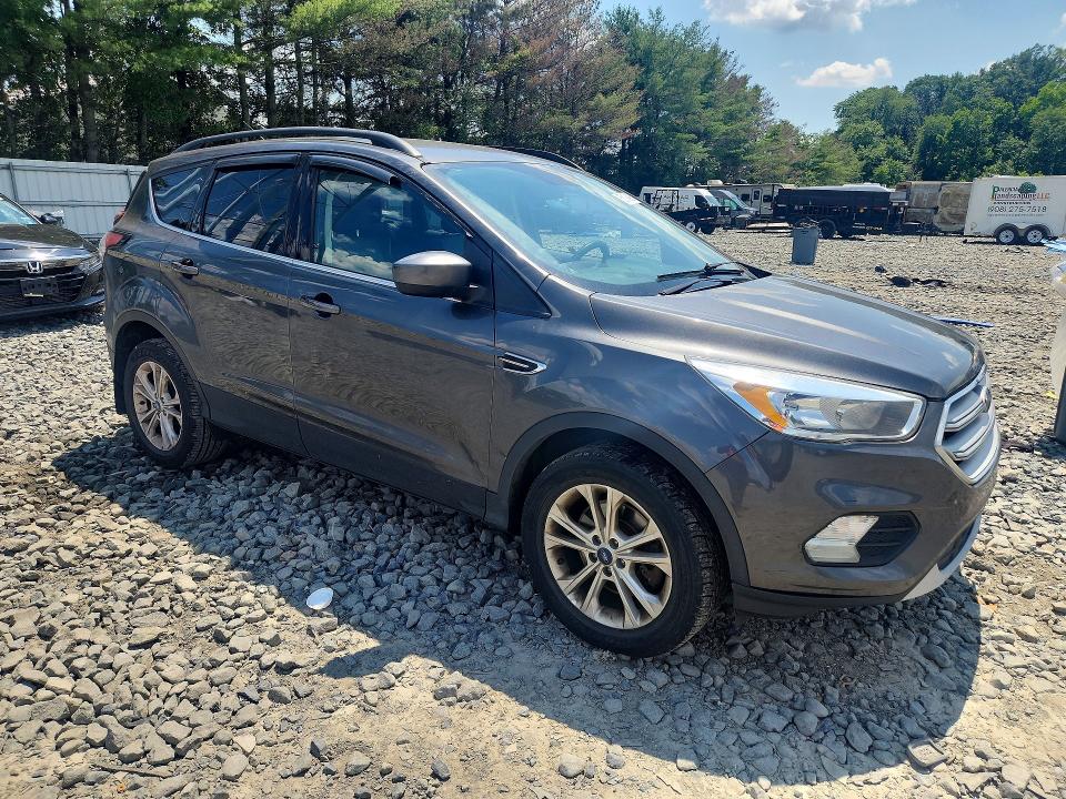 Photo 4 from auction – 2018 FORD ESCAPE with VIN 1FMCU9GD6JUA35307