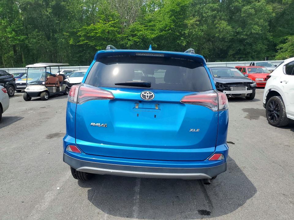 Photo 6 from auction – 2018 TOYOTA RAV4 with VIN 2T3WFREV2JW411981