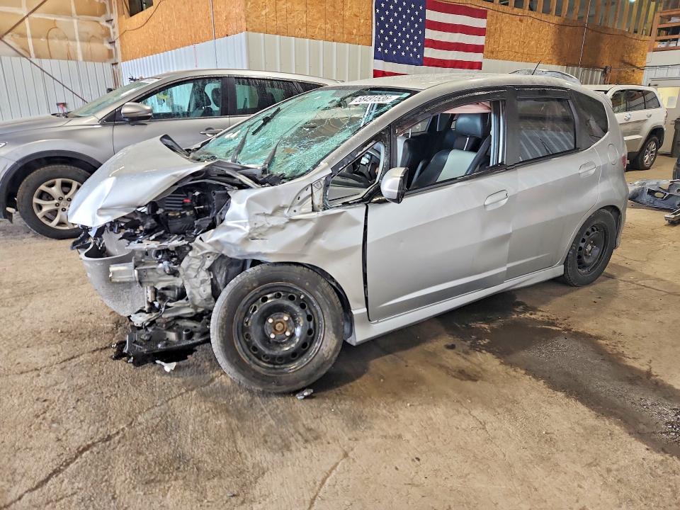 HONDA FIT 2011 with VIN JHMGE8H51BS004787 - Photo from auction
