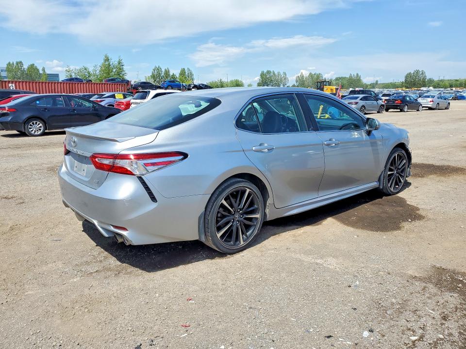 Photo 3 from auction – 2022 TOYOTA CAMRY with VIN 4T1G11AK1NU628162