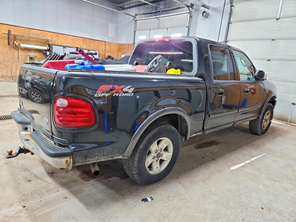 Photo 3 from auction – 2003 FORD F150 with VIN 1FTRW08L33KC56226