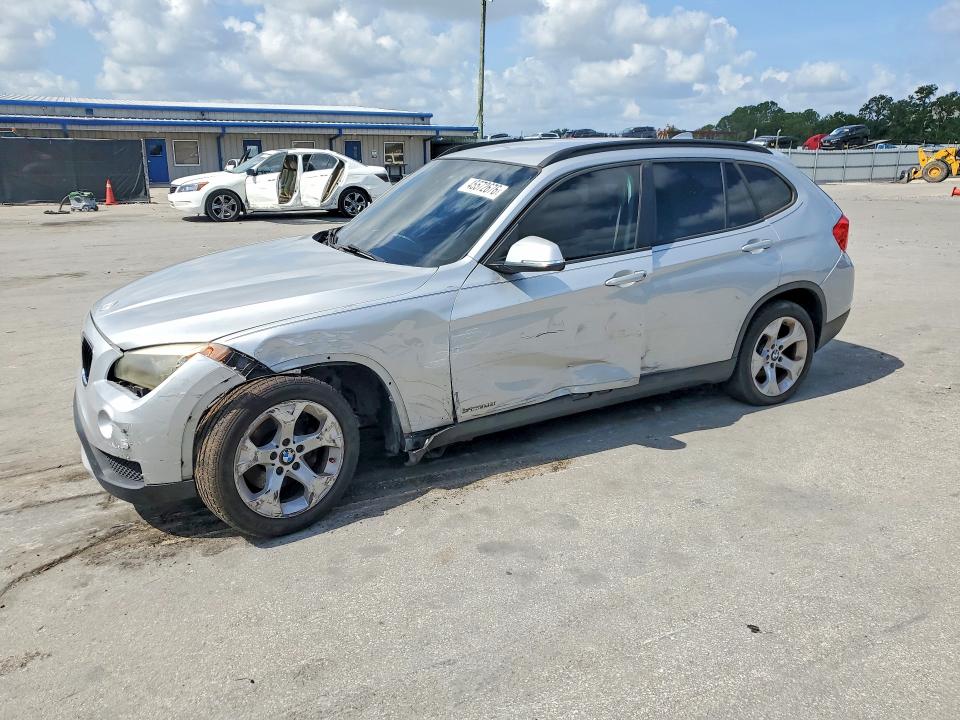 BMW X1 2014 with VIN WBAVM1C53EVW49371 - Photo from auction
