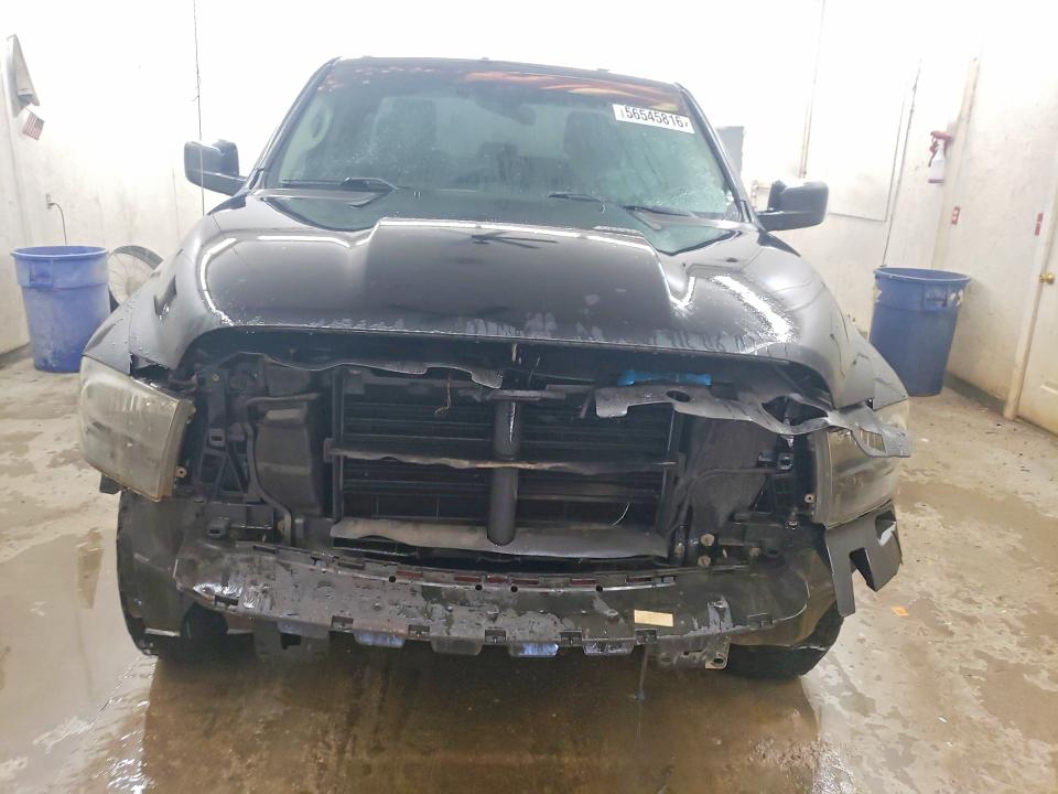 Photo 5 from auction – 2018 RAM 1500 with VIN 1C6RR7FG5JS327324
