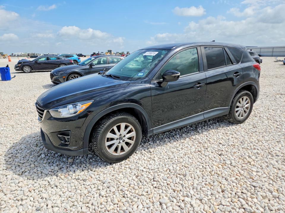 MAZDA CX-5 2016 with VIN JM3KE4CYXG0889037 - Photo from auction