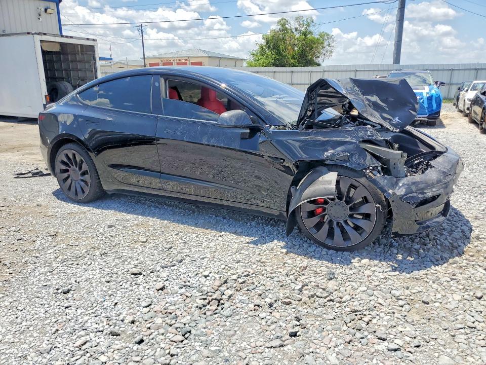 Photo 4 from auction – 2022 TESLA MODEL 3 with VIN 5YJ3E1EC5NF123535