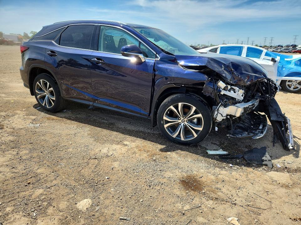 Photo 4 from auction – 2022 LEXUS RX with VIN 2T2HZMDA0NC320978