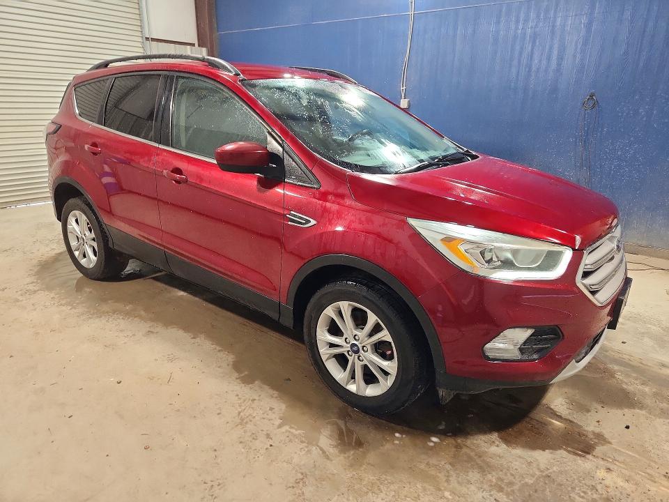 Photo 4 from auction – 2017 FORD ESCAPE with VIN 1FMCU9GD2HUC57546