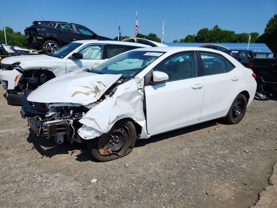 TOYOTA COROLLA 2017 with VIN 5YFBURHE9HP658466 - Photo from auction