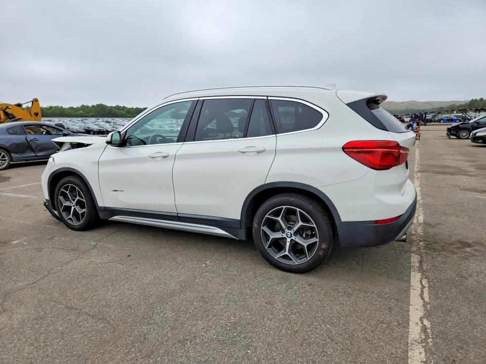 Photo 2 from auction – 2016 BMW X1 with VIN WBXHT3C35G5E56449