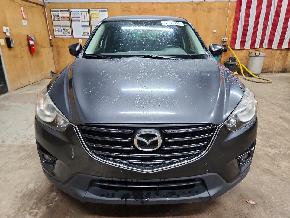 Photo 5 from auction – 2016 MAZDA CX-5 with VIN JM3KE4CYXG0797247