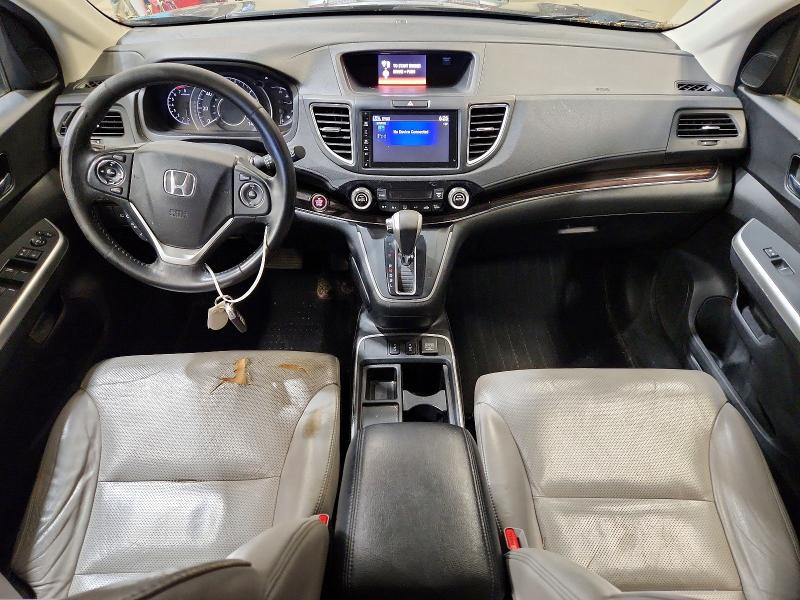 Photo 8 from auction – 2015 HONDA CR-V with VIN 2HKRM4H72FH643076