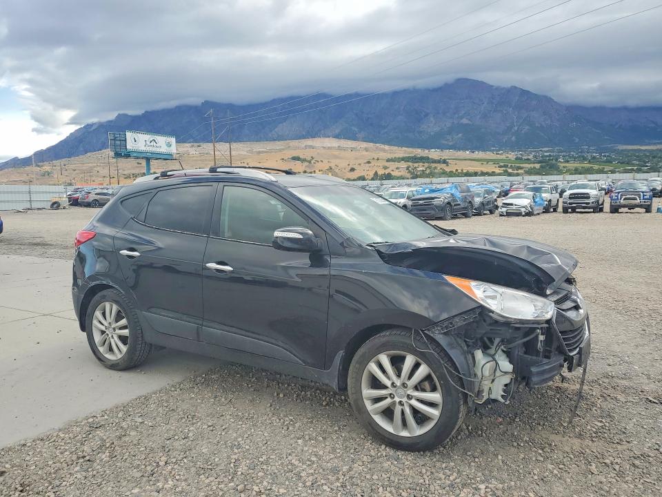 Photo 4 from auction – 2011 HYUNDAI TUCSON with VIN KM8JUCAC6BU291095