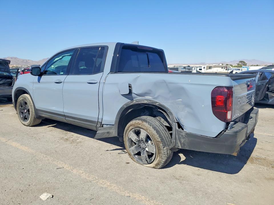 Photo 2 from auction – 2024 HONDA RIDGELINE with VIN 5FPYK3F81RB012899