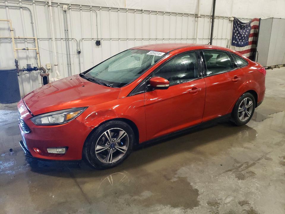 FORD FOCUS 2018 with VIN 1FADP3FE8JL240985 - Photo from auction