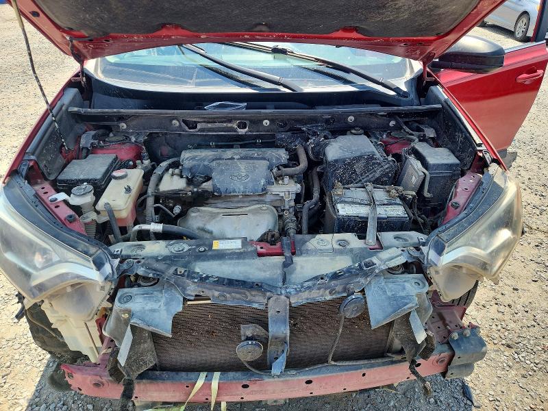 Photo 12 from auction – 2016 TOYOTA RAV4 with VIN JTMZFREV2GJ083949
