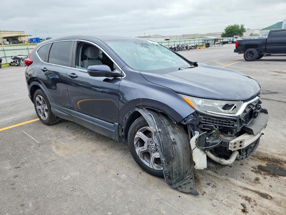 Photo 4 from auction – 2019 HONDA CR-V with VIN 7FARW1H5XKE031860