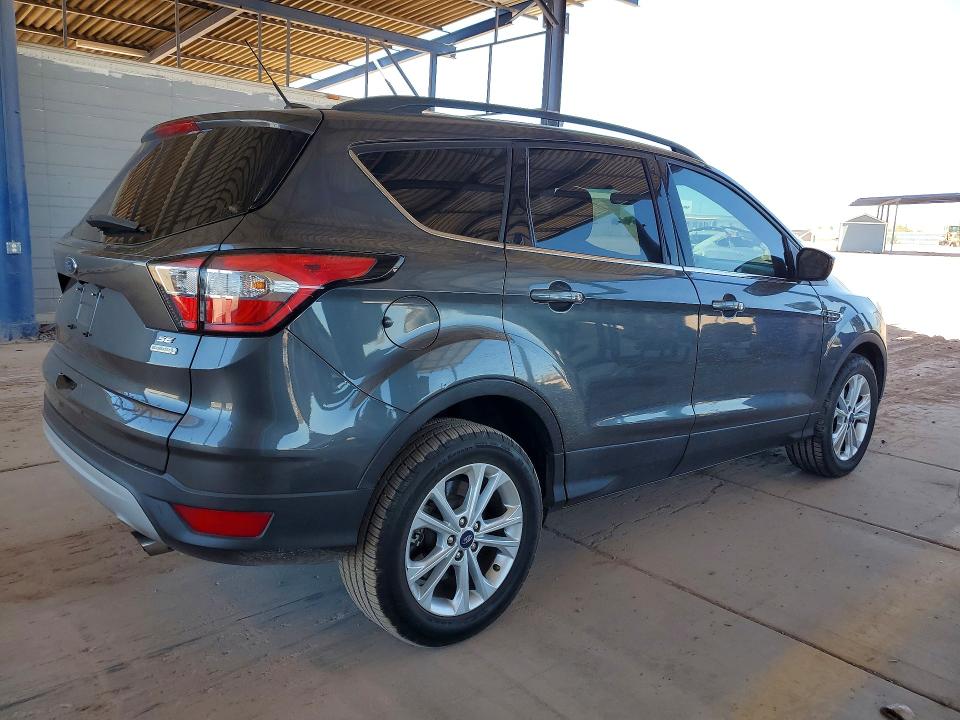 Photo 3 from auction – 2018 FORD ESCAPE with VIN 1FMCU0GD1JUC70855