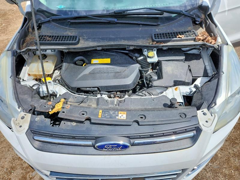 Photo 11 from auction – 2016 FORD ESCAPE with VIN 1FMCU0GX5GUC53575