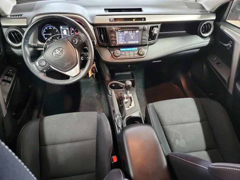 Photo 8 from auction – 2016 TOYOTA RAV4 with VIN 2T3RFREV7GW478355