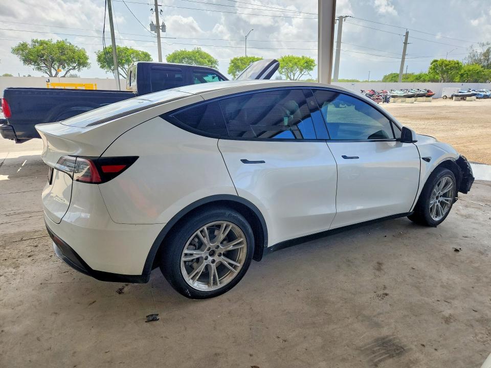 Photo 3 from auction – 2023 TESLA MODEL Y with VIN 7SAYGDEE6PA138521