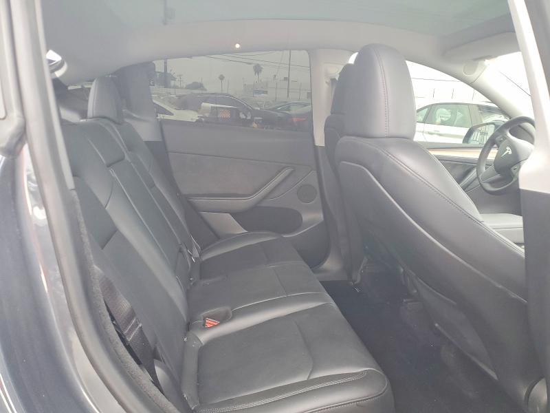 Photo 11 from auction – 2023 TESLA MODEL Y with VIN 7SAYGDEE0PA042738