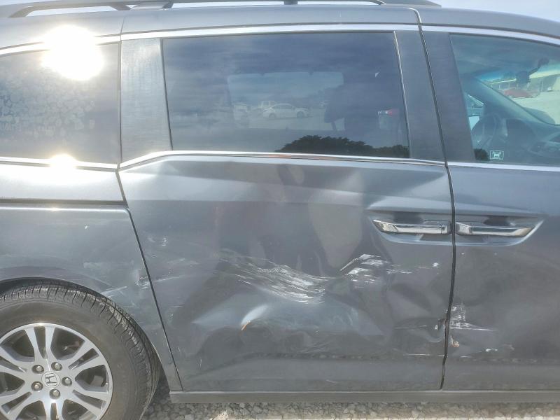 Photo 11 from auction – 2011 HONDA ODDESEY with VIN 5FNRL5H44BB061987