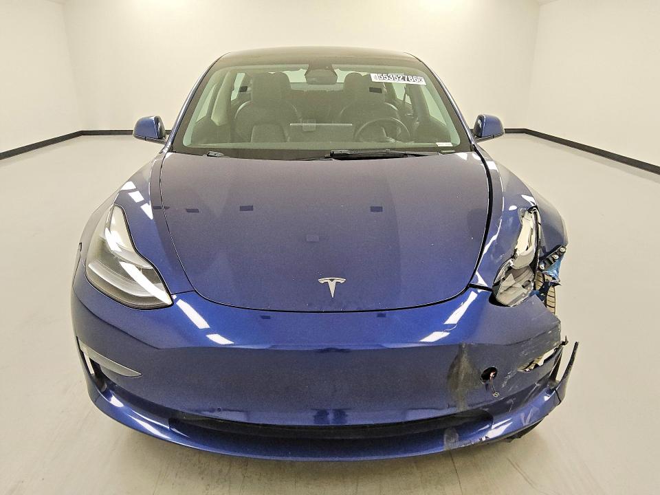 Photo 5 from auction – 2022 TESLA MODEL 3 with VIN 5YJ3E1EB0NF286634