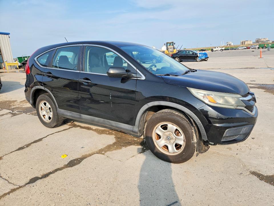 Photo 4 from auction – 2015 HONDA CR-V with VIN 3CZRM3H37FG705761
