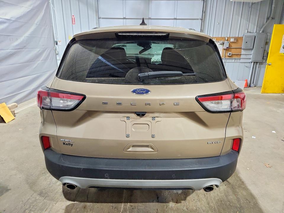 Photo 6 from auction – 2021 FORD ESCAPE with VIN 1FMCU9H65MUB35676