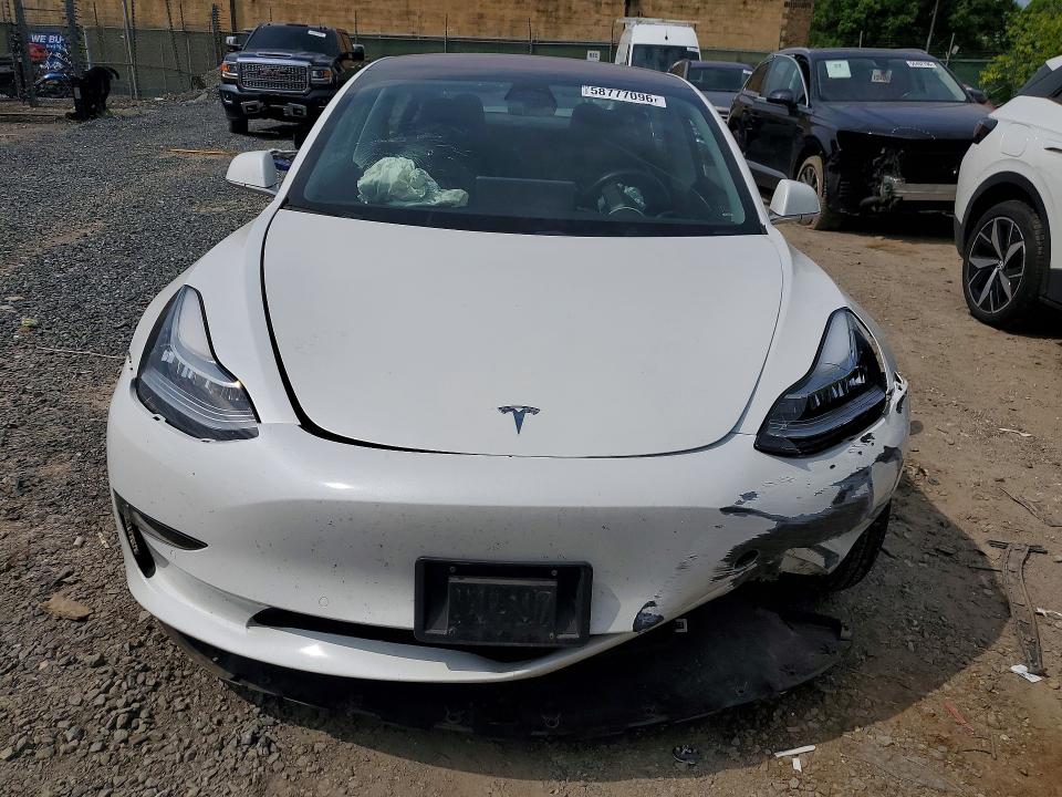 Photo 5 from auction – 2018 TESLA MODEL 3 with VIN 5YJ3E1EAXJF026193