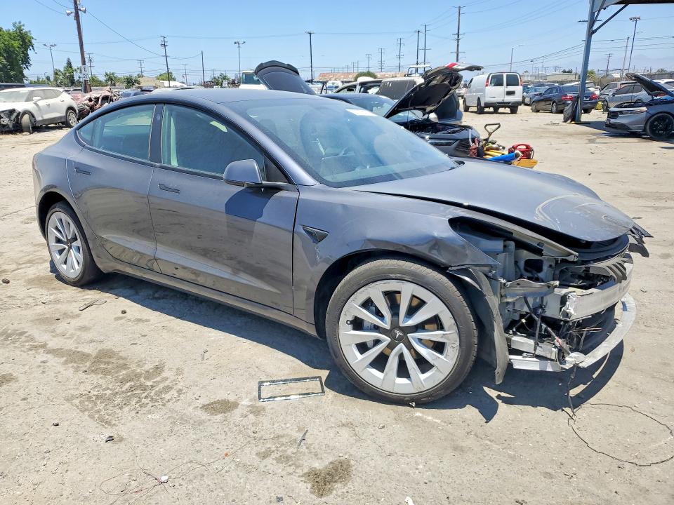 Photo 4 from auction – 2022 TESLA MODEL 3 with VIN 5YJ3E1EA9NF296702