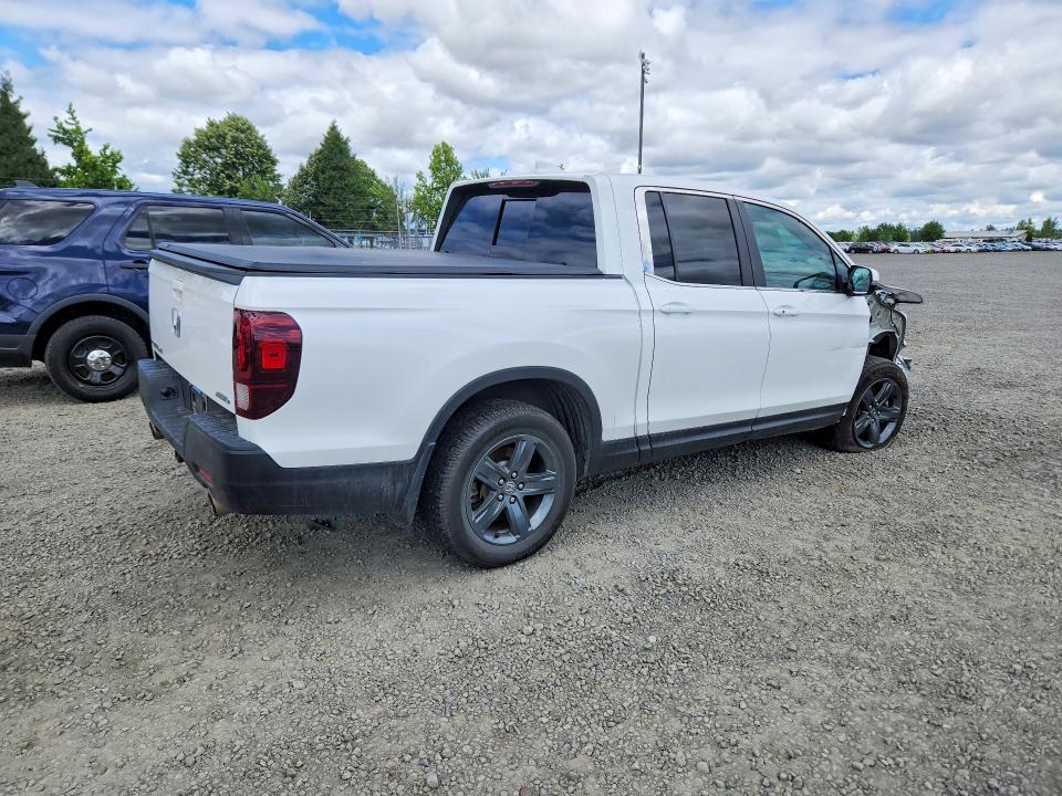 Photo 3 from auction – 2023 HONDA RIDGELINE with VIN 5FPYK3F56PB061941