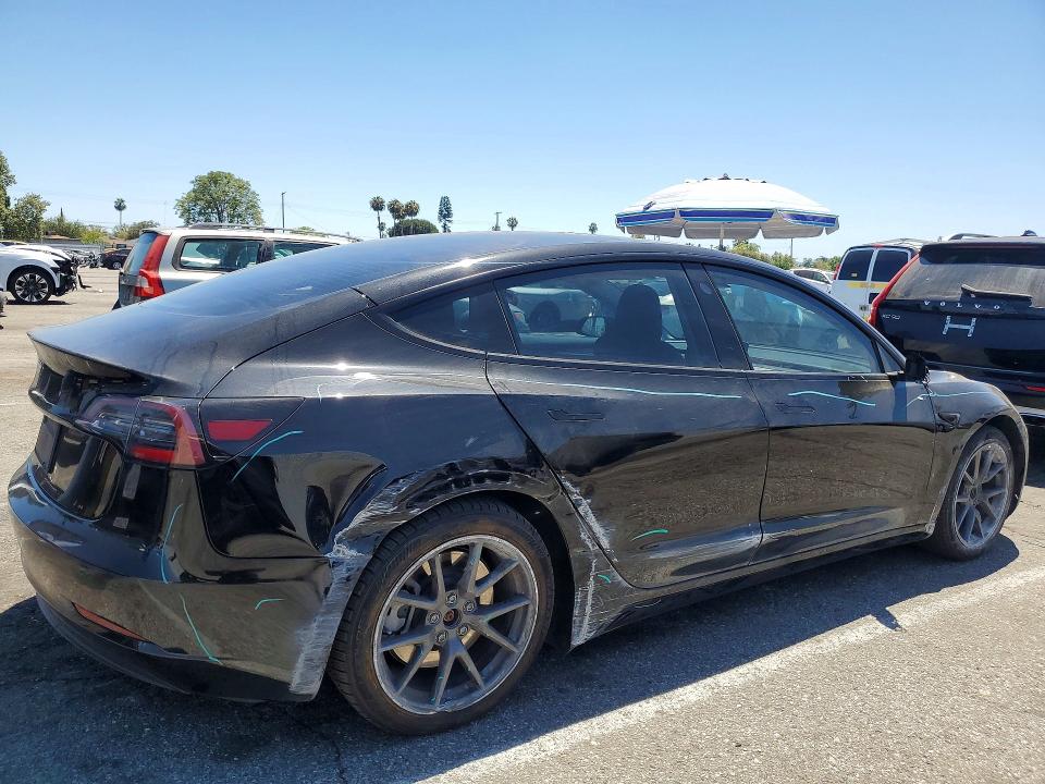 Photo 3 from auction – 2023 TESLA MODEL 3 with VIN 5YJ3E1EA4PF432625