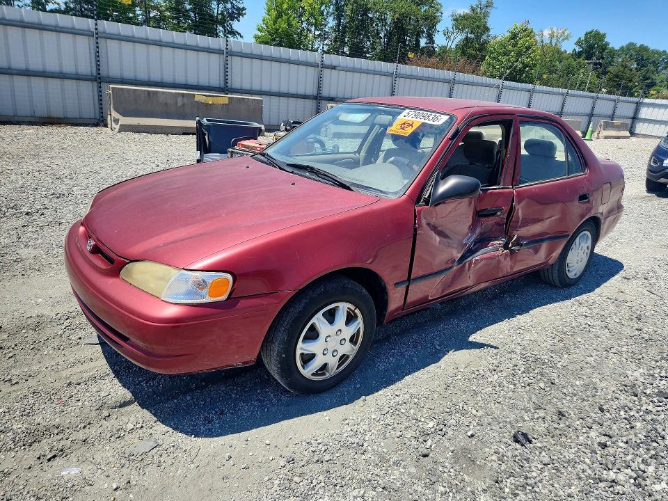 TOYOTA COROLLA 1999 with VIN 2T1BR12E1XC124839 - Photo from auction