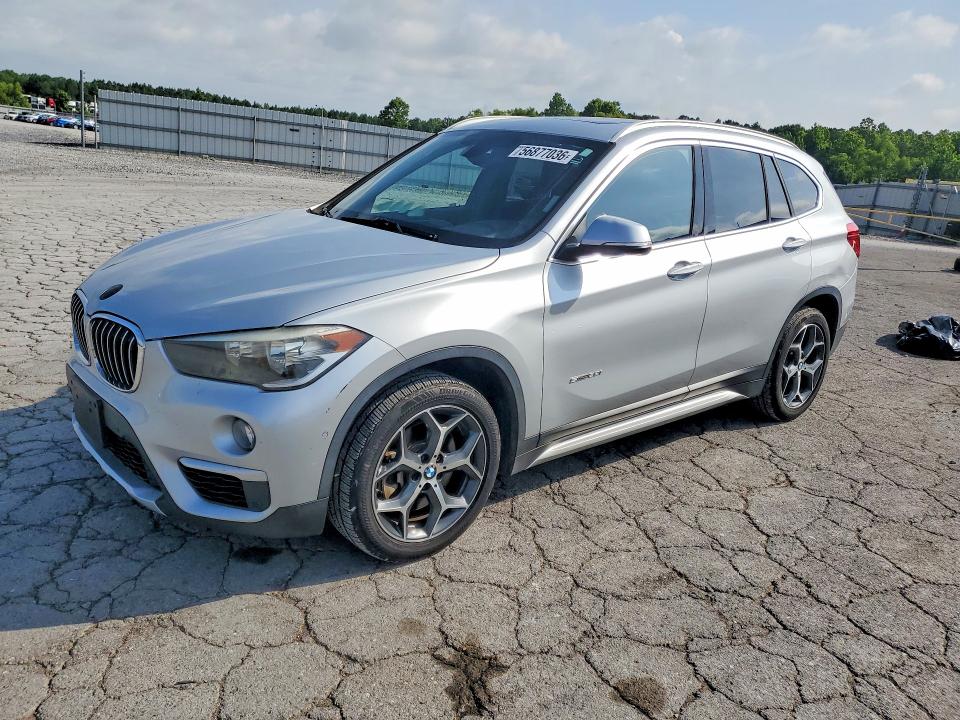 BMW X1 2017 with VIN WBXHU7C30H5H34986 - Photo from auction