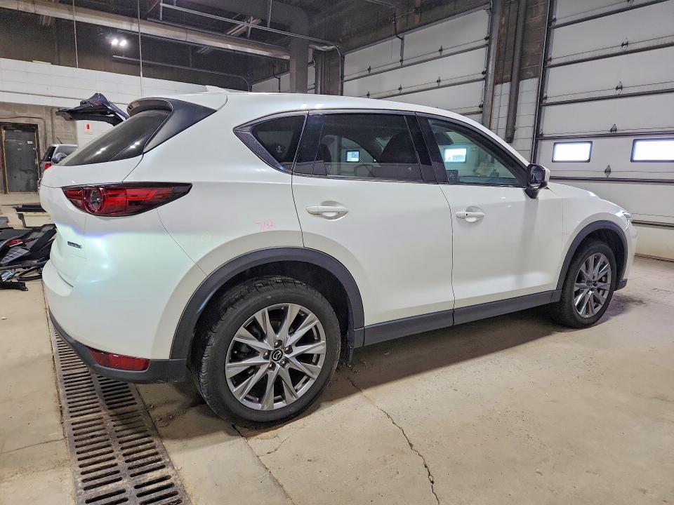 Photo 3 from auction – 2021 MAZDA CX-5 with VIN JM3KFBDMXM0347073