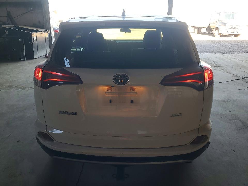 Photo 6 from auction – 2018 TOYOTA RAV4 with VIN JTMWFREV9JJ742930